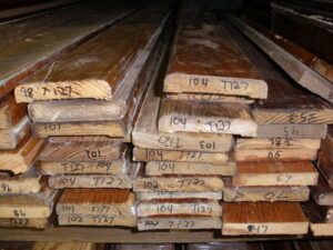 A picture of a stack of reclaimed vintage woodwork.