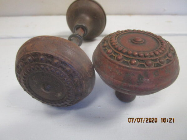 Picture of antique door knobs.