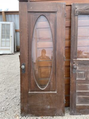 Uncommon Oval Beveled Glass Door