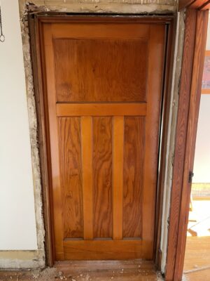 Vintage Pocket Door with Uncommon Paneling